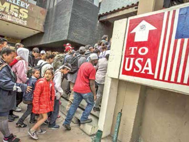 Migrantes tocan las puertas de EU; finaliza la marcha en Tijuana